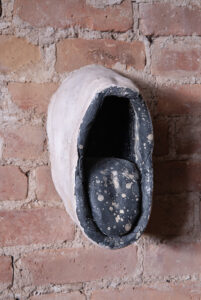 Untitled Mask , 1992 plaster, ink, paper, and wax 11 x 6 5/8 x 6 1/4 in.